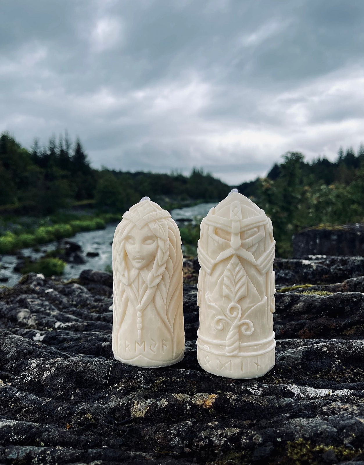 Odin and Freyja ritual candles on rocky landscape — Fyrda Candle Norse gift set in nature